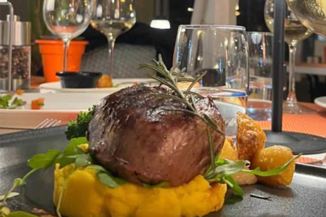 Enjoy delicious food in front of one of the most beautiful coasts of the Mediterranean