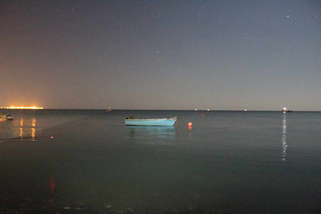 Fishing at night with the stars