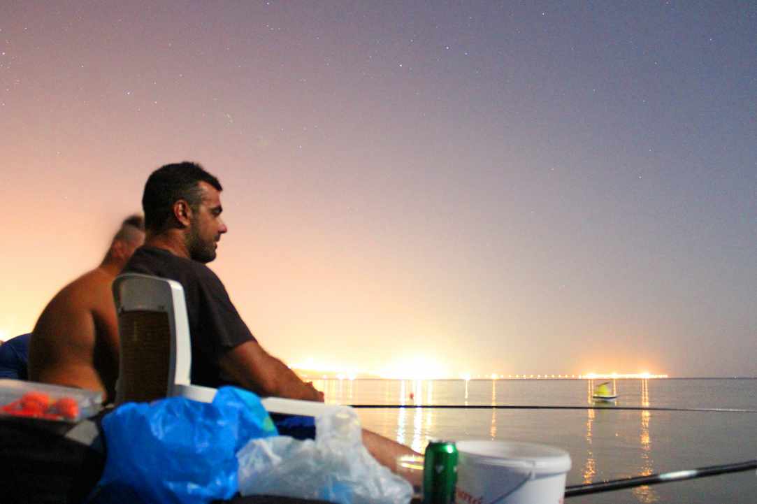 Fishing at night with the stars