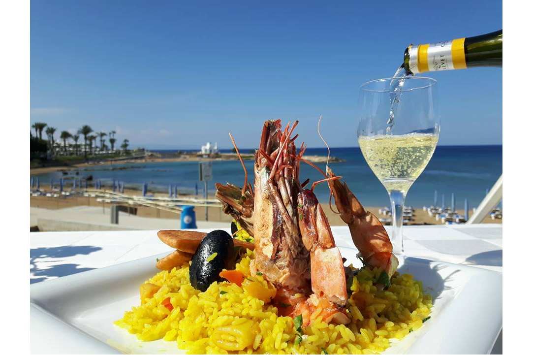 Eating fresh fish right on the beach feels like paradise!