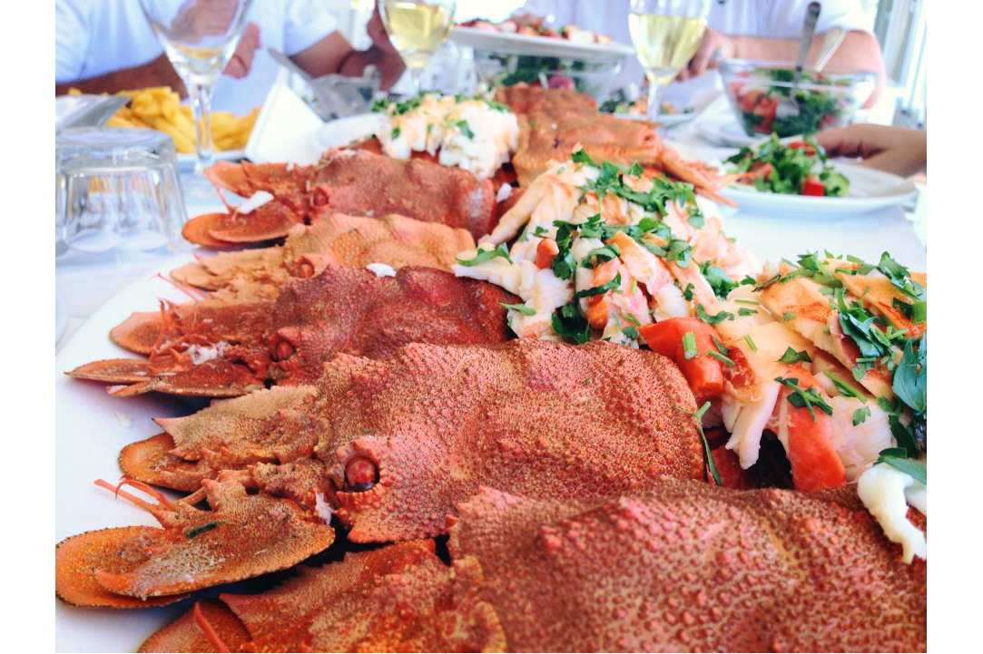 Eating fresh fish right on the beach feels like paradise!