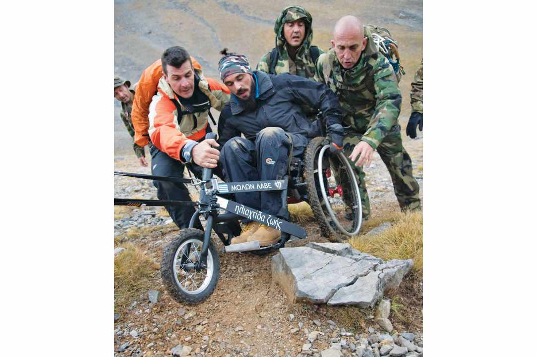 The Cypriot paraplegic who managed to climb to the top of Olympus in a wheelchair!